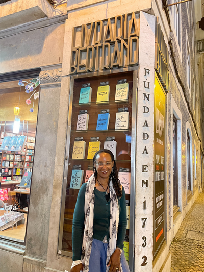 Kennetha standing outside of a bookstore