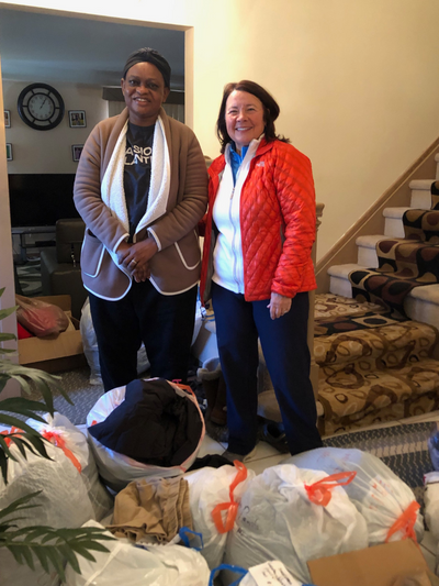 French UMC pastor Gertrude and Brenda Balas with donations