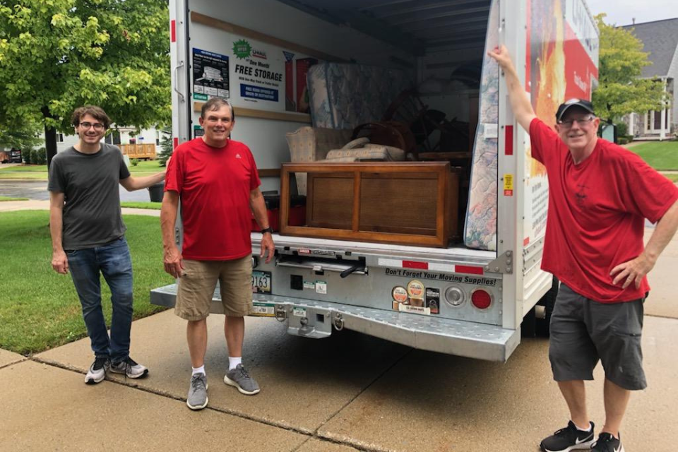 Church members deliver home furnishings to neighbors
