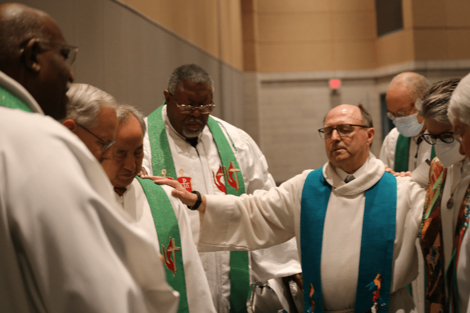 Bishops praying