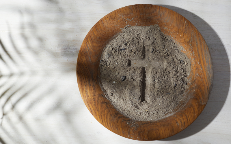 ashes cross palm shadow lent in a box resources