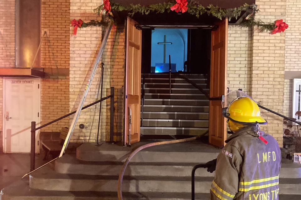 Fireman outside church that had caught fire