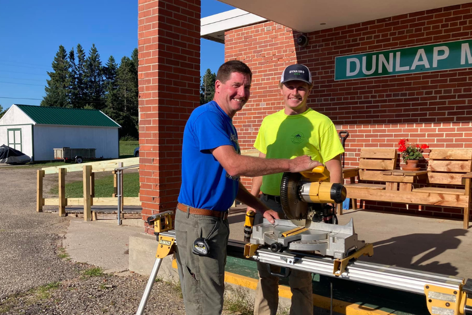 Volunteers building a ramp