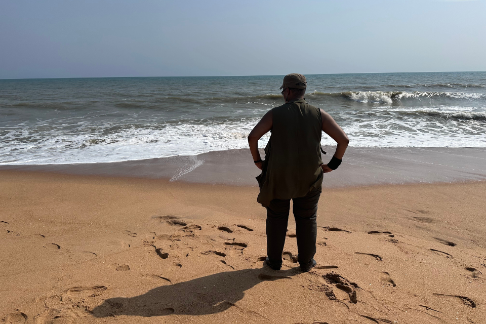 Woman standing on a beach