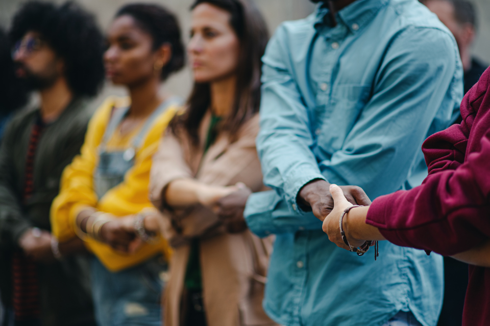 People holding hands during a march