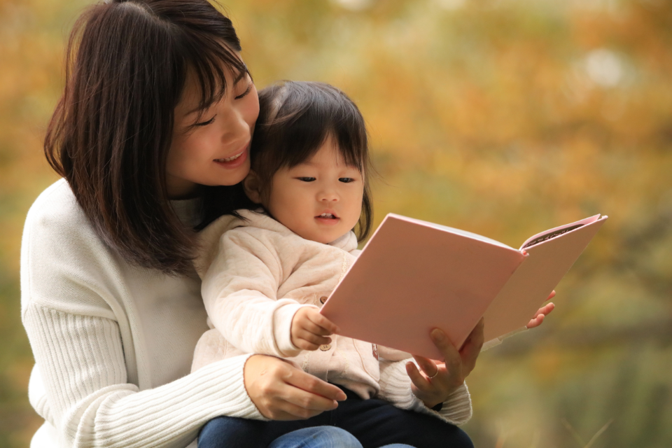 Mother reading to child