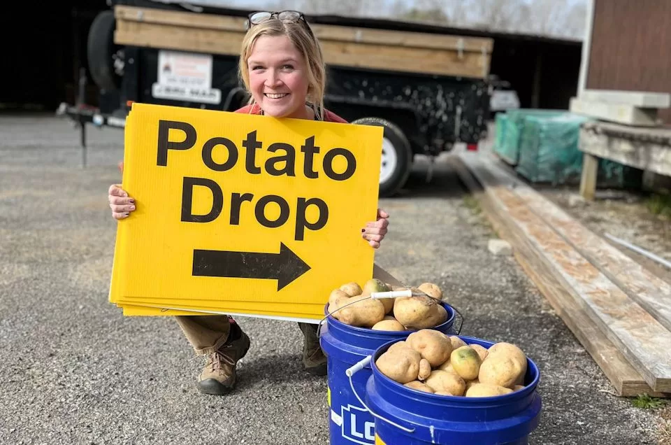 Dropping off potatoes for mission