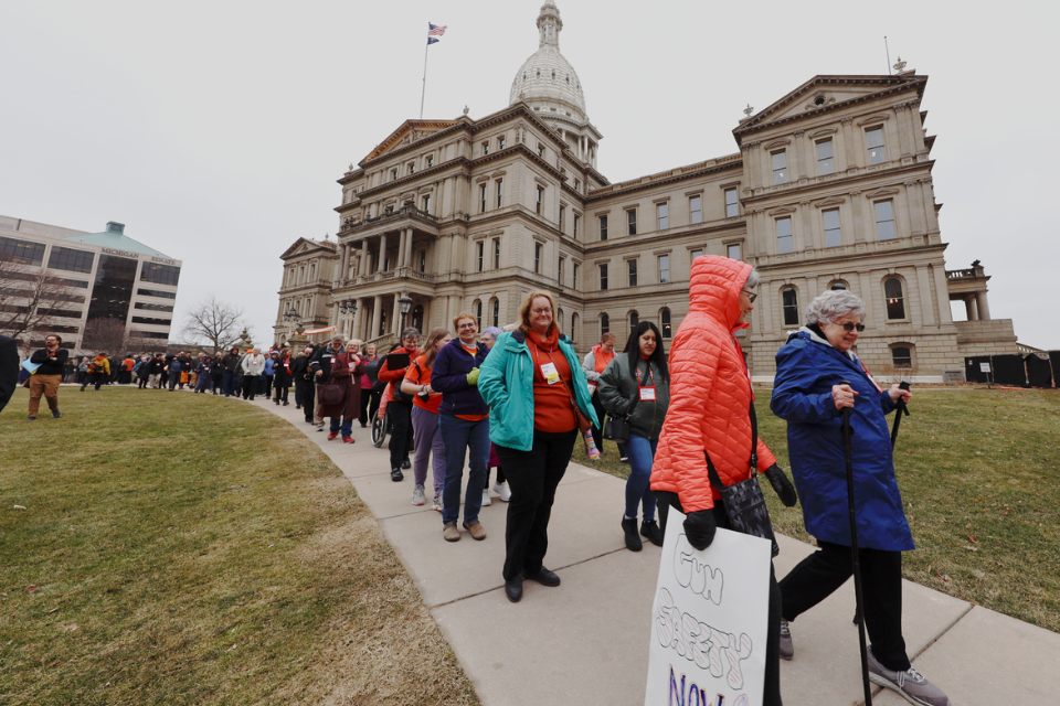 People walking from the State Capitol