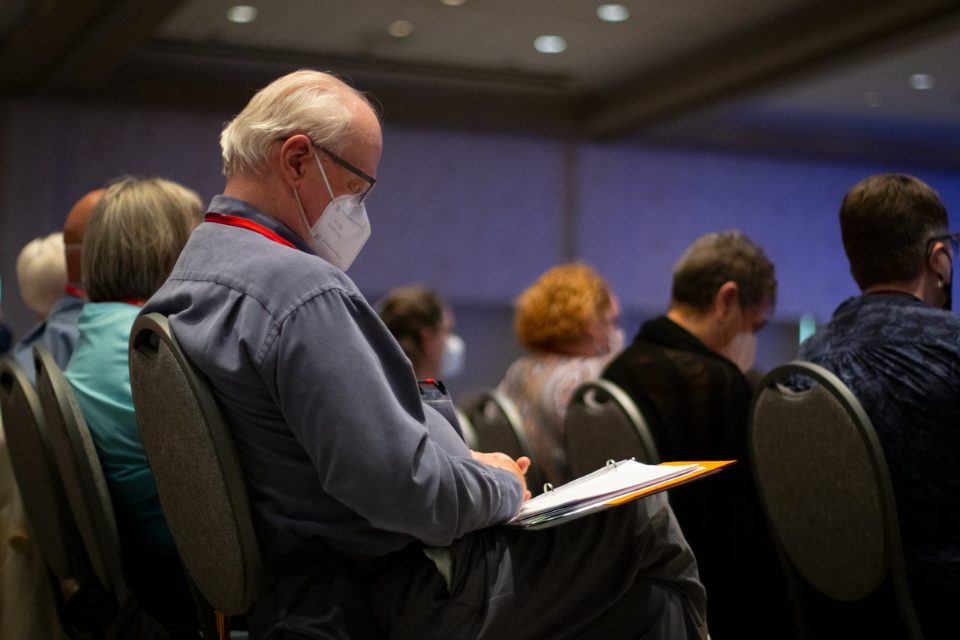 Man reading conference business