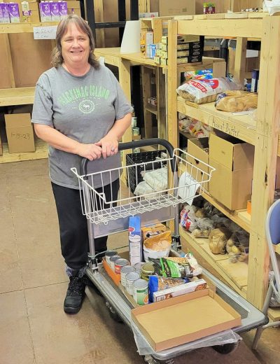 Volunteer working at food pantry