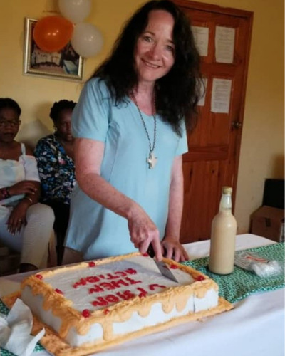 Woman cutting cake