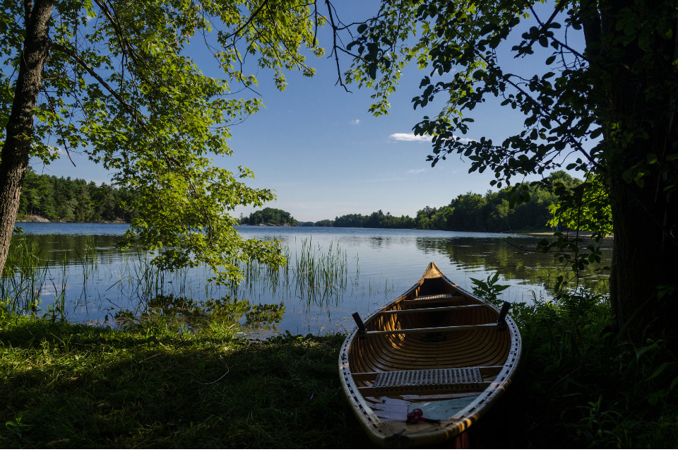 Canoe next to a lake