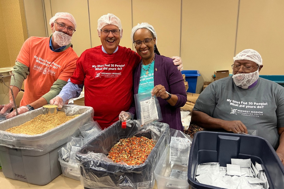 Bishops packing Rice Meal Bags for hunger relief