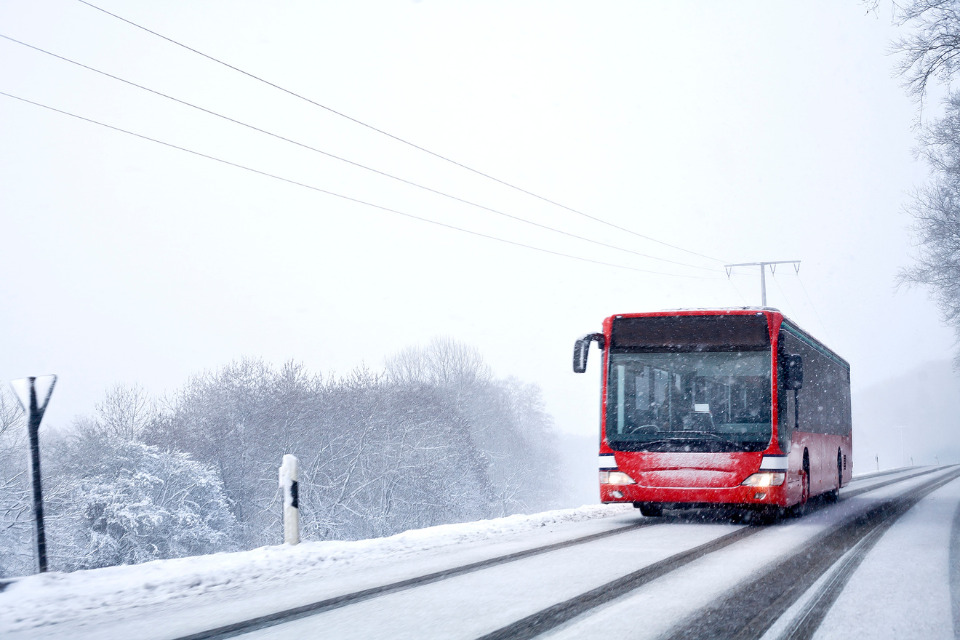 Bus driving in the snow