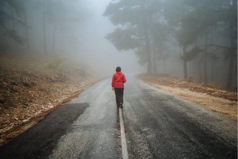 Man walking in fog