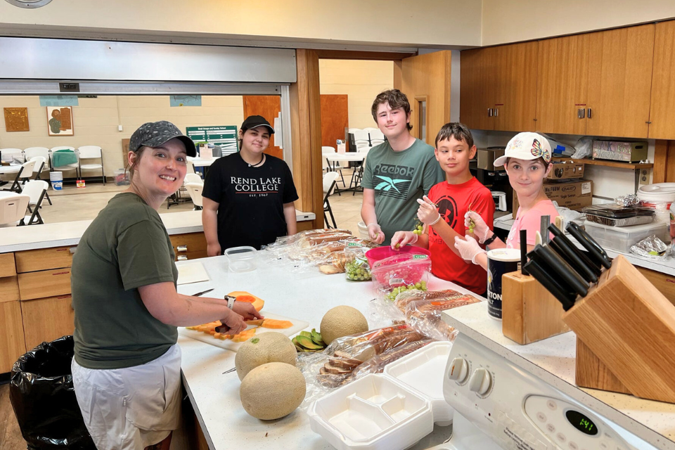 Mission volunteers working in a kitchen