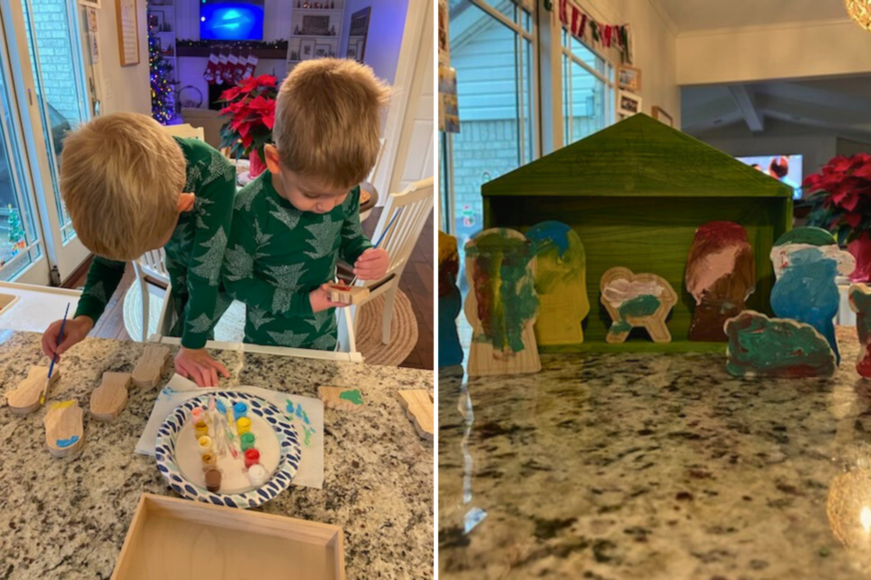 Children painting a nativity set