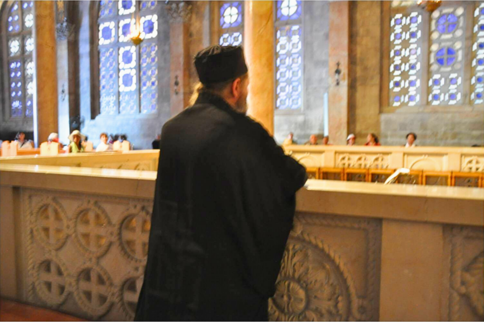 Priest praying