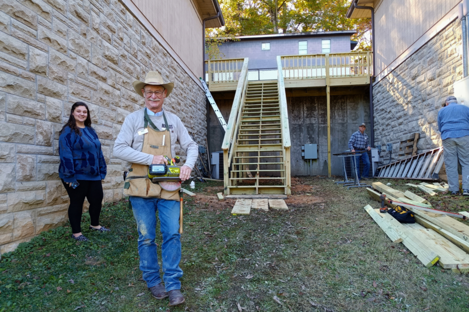 Volunteers building stairs