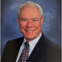 Head shot picture of Paul L. Hartman smiling