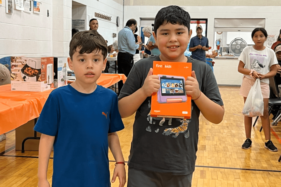 Children with their prizes won during the raffle