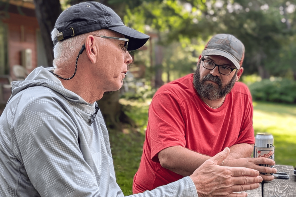 Two men talking