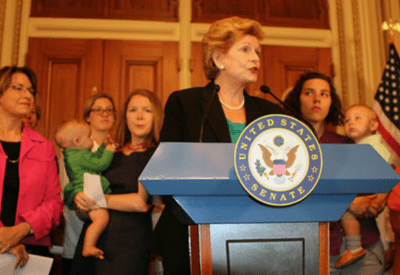 Senator speaking at a press conference