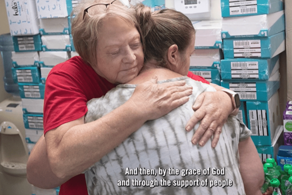 Two people hugging