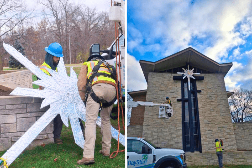 Star being placed on church building