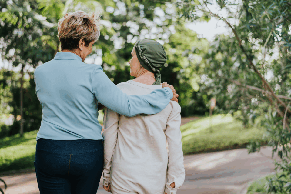 Woman comforting a cancer patient