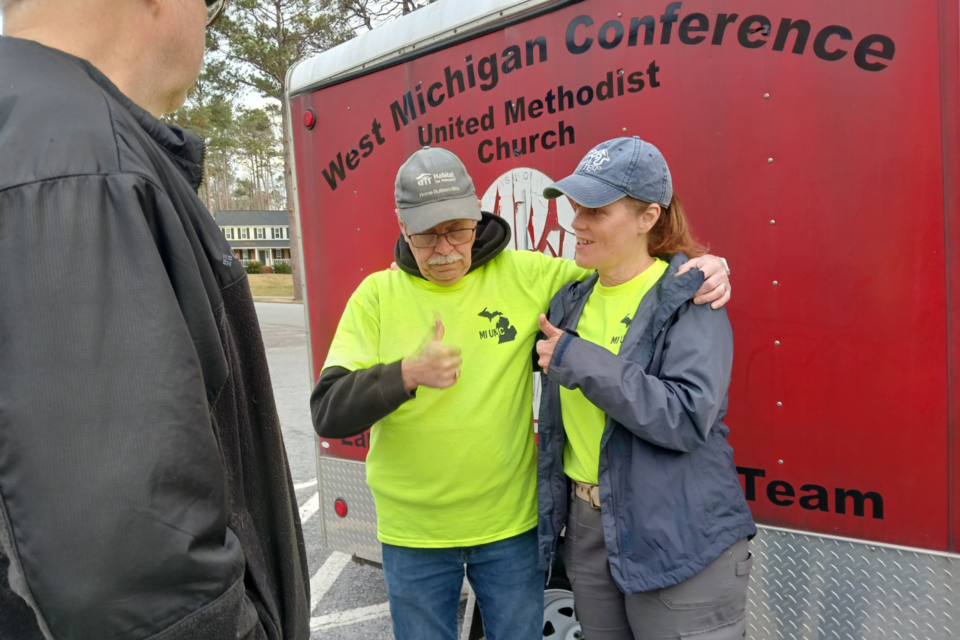 Two volunteers of a disaster response team