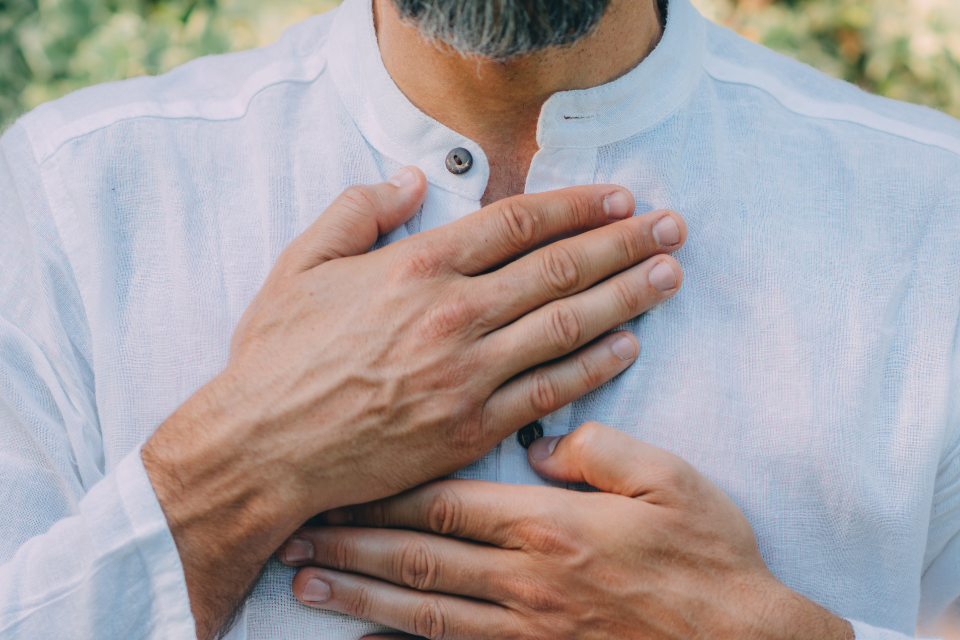 Man with arms on his chest