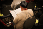 Person reviewing voting materials