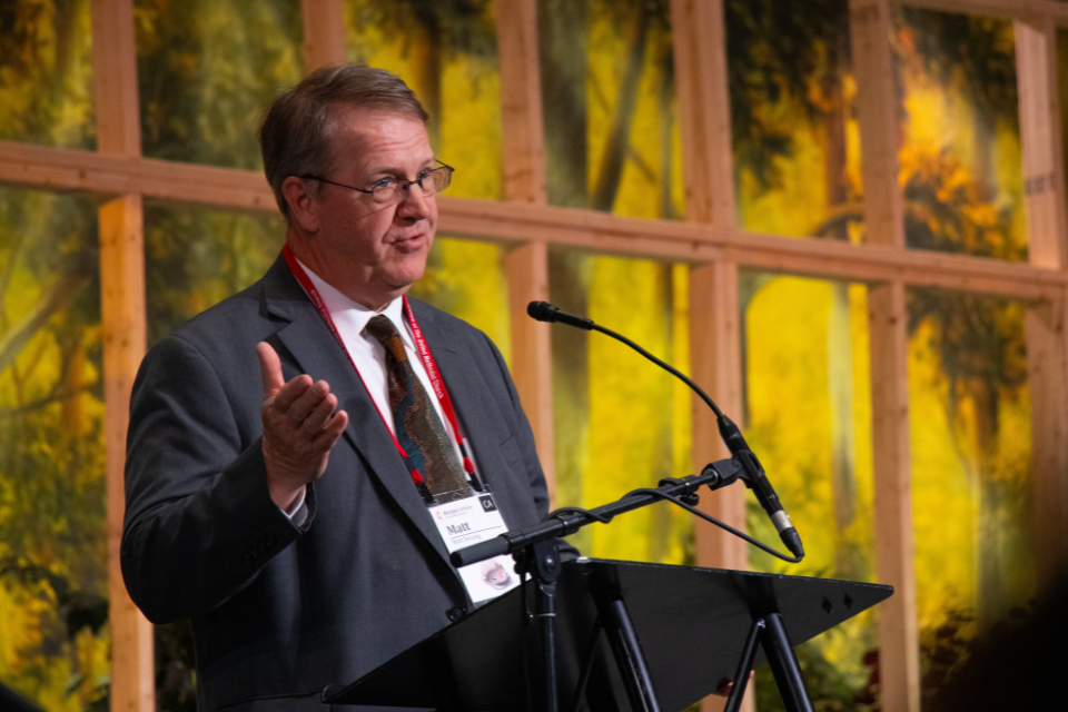 Man speaks during conference
