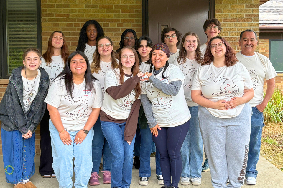 Young adults from intern program pose for photo