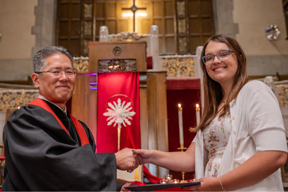 Student receiving scholarship