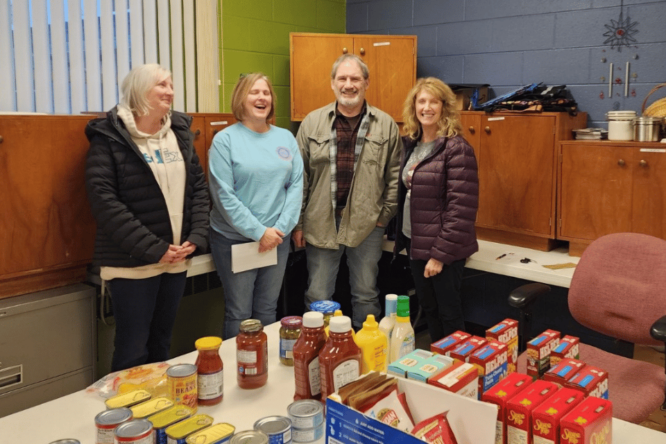 Volunteers working at a church food pantry