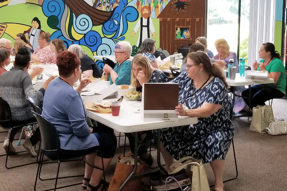 People eating together and having conversation