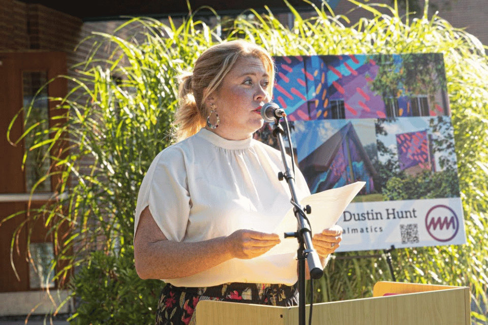 Woman speaking at podium