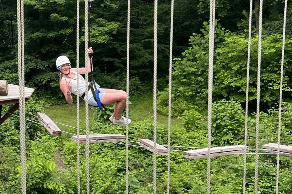Girl at camp on ropes course