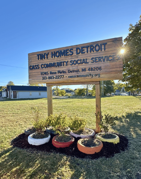 Flower beds around a sign