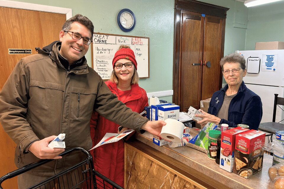Clients receiving food at a food distribution site
