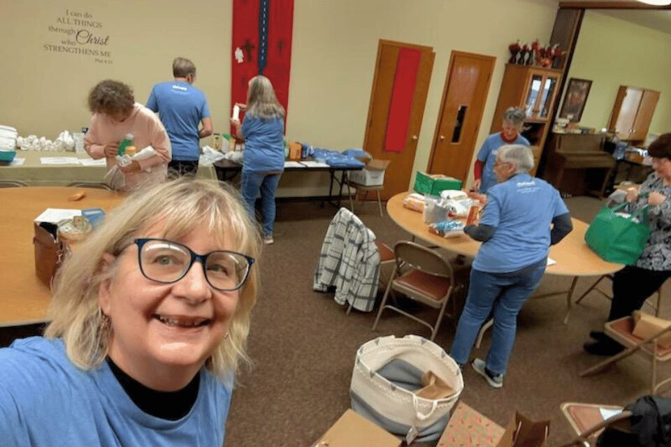 People assembling kits