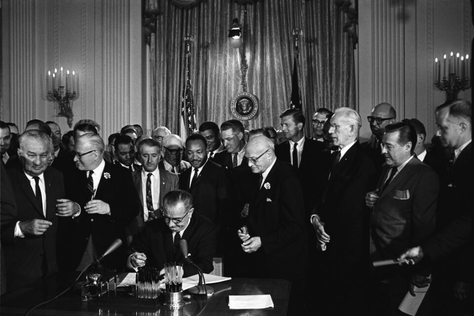 President Lyndon Johnson signs voting act
