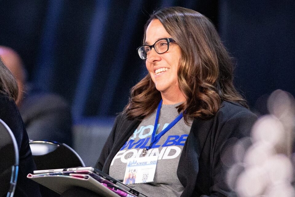 Woman waiting to speak at conference
