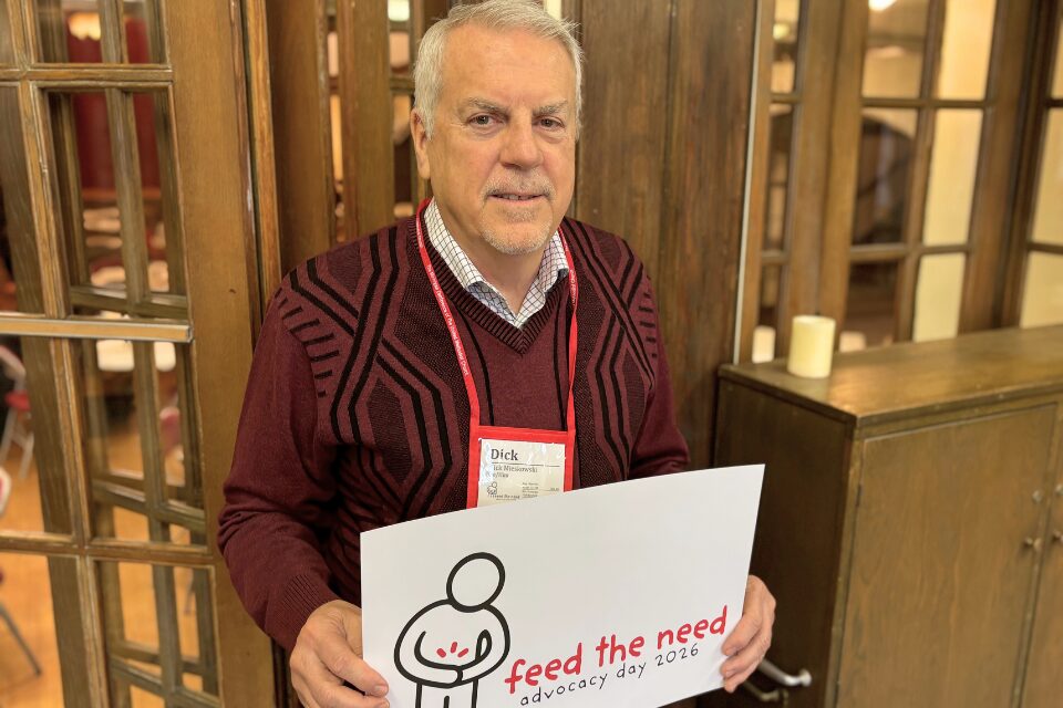 Church member holding a sign
