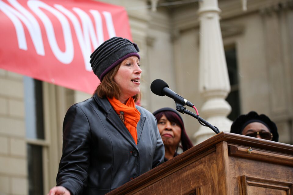Rep. Julie Rogers speaking at a rally