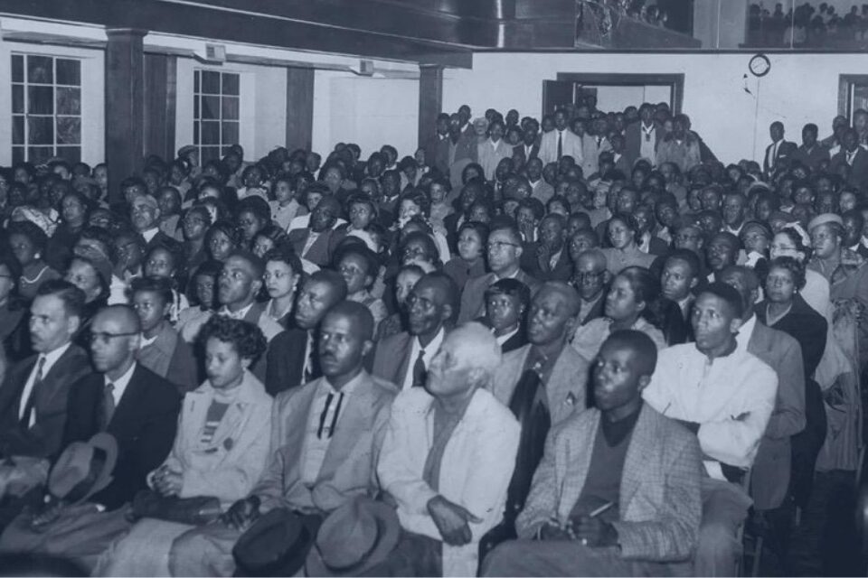 Crowd watching a preacher preach
