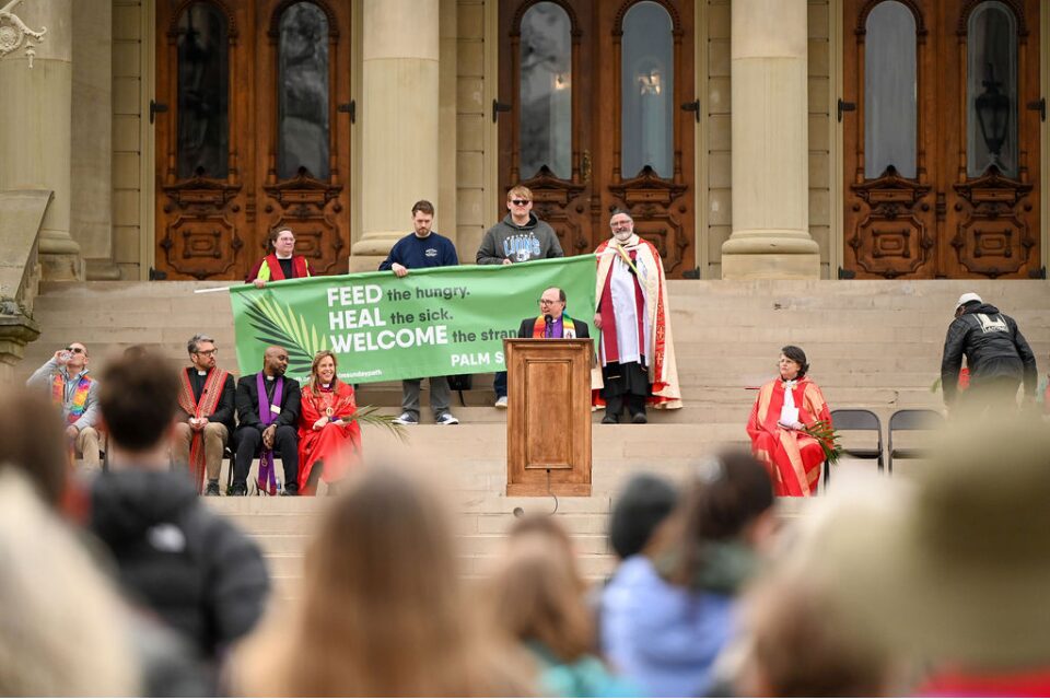 Bishop Bard speaking in Lansing