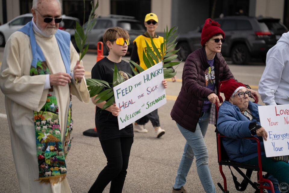 Marchers at a Palm Sunday rally